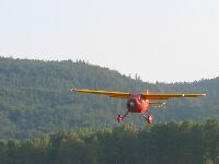 Monocoupe on final with flaps an lights